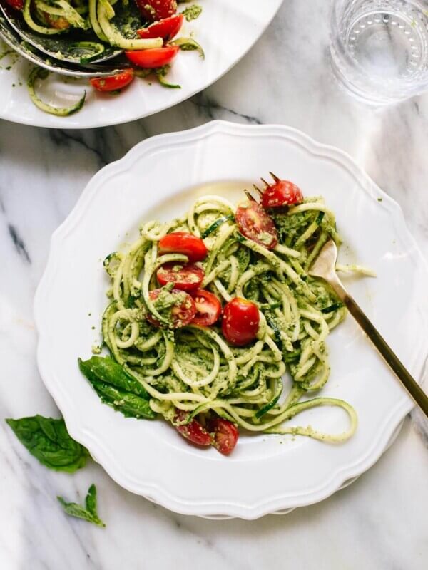Delicious zucchini noodles (zoodles) with pesto and tomatoes - cookieandkate.com