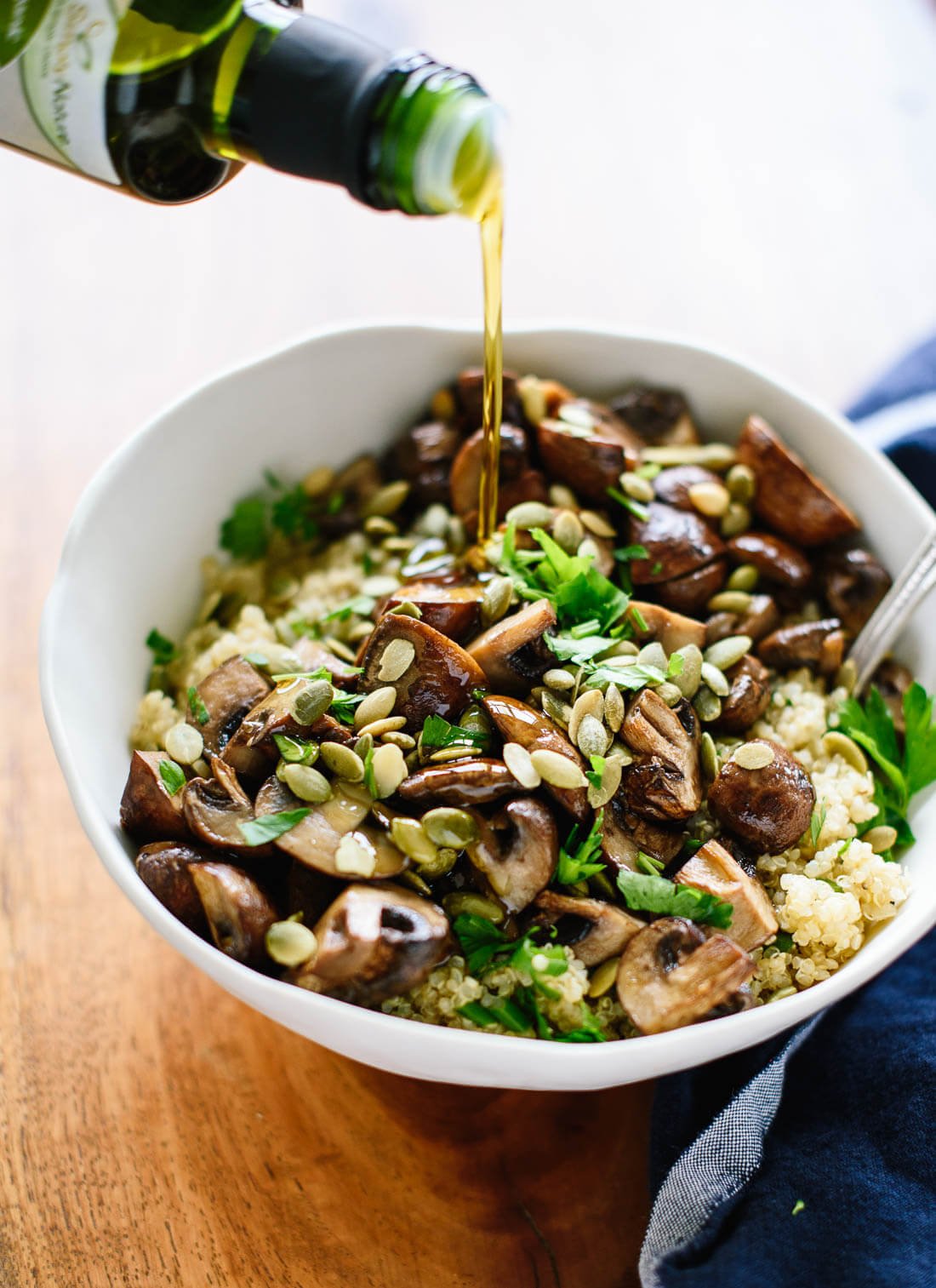 Roasted mushrooms on herbed quinoa with olive oil and pepitas