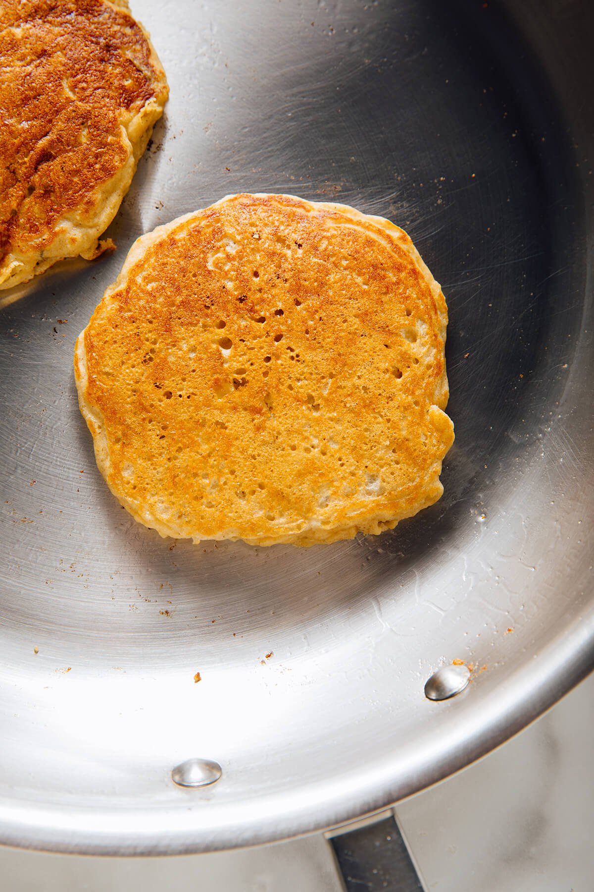 apple pancakes in skillet